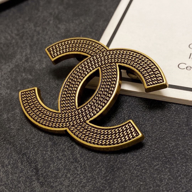 Ch**el brooches